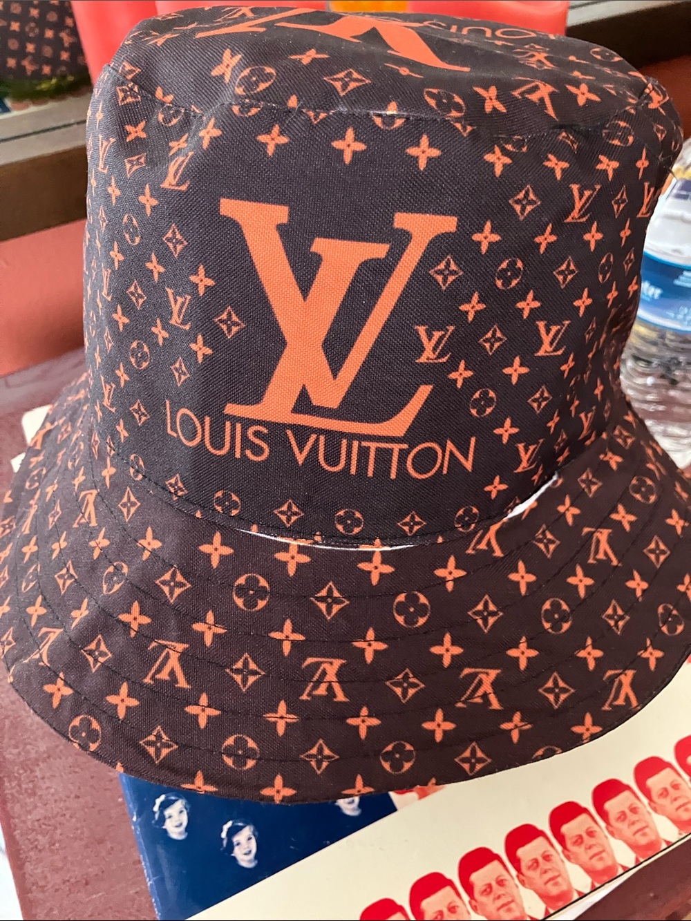 FauxLouis Vuitton Navy and Orange Monogram Bucket Hat.